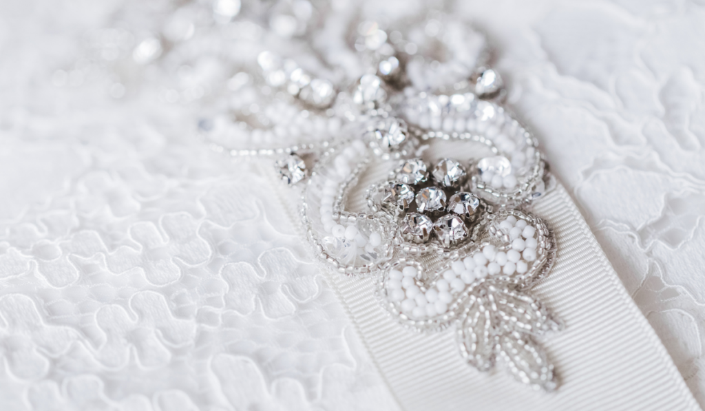 Beautiful details of a wedding dress beadwork close-up