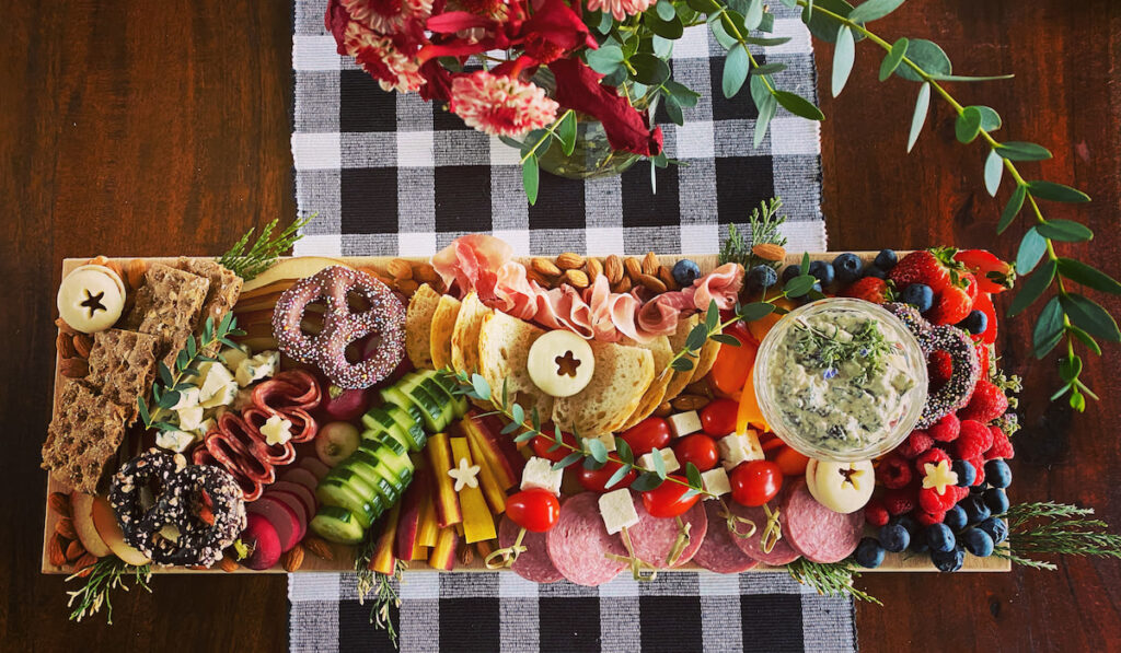 Colorful charcuterie, snack food on a wooden table
