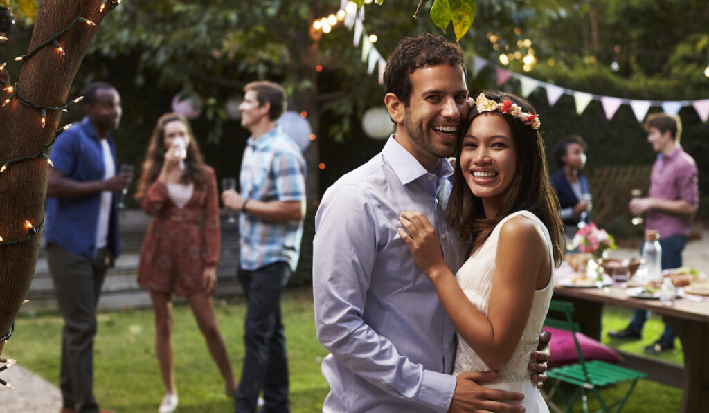 Couple-Celebrating-Wedding-With-Backyard-Party