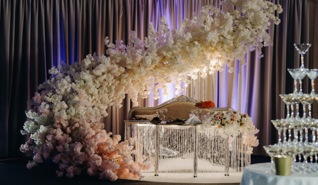 Decorated Table with white flowers for a wedding reception