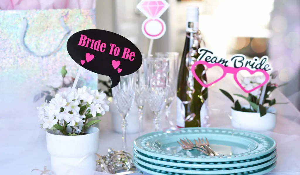 Table set up with decorations for bridal shower party