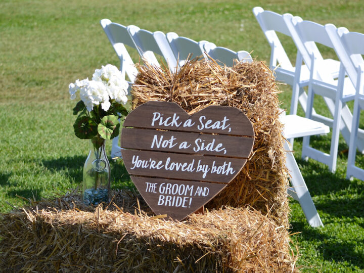 Wedding day sign from the bride and groom on wooden heart board