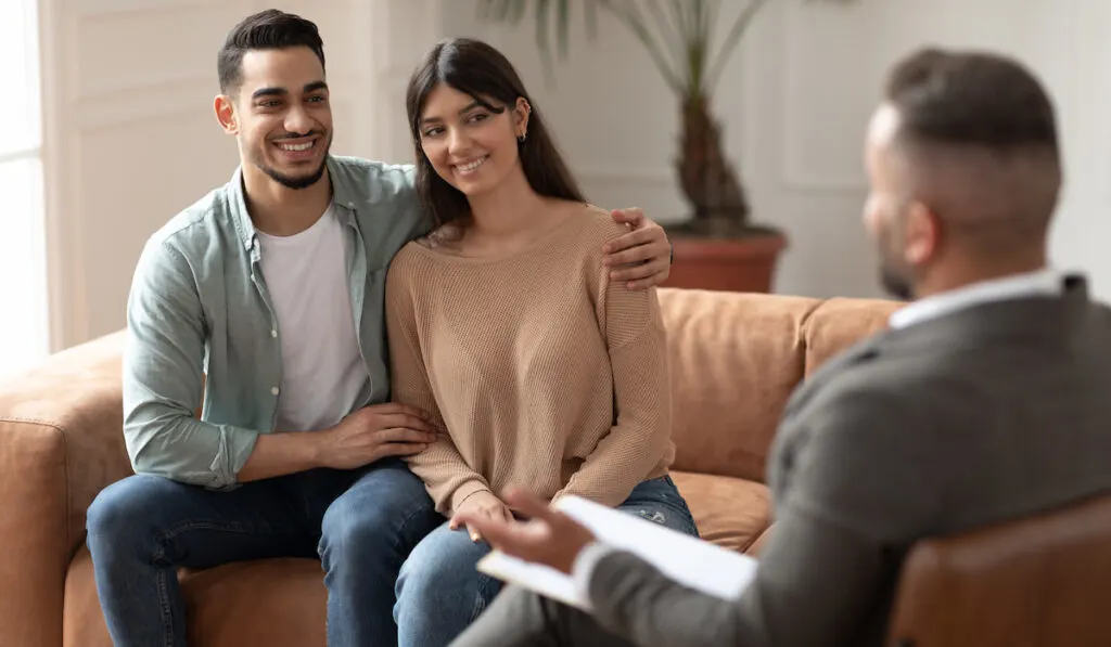 couple satistfied with the help and assurance from their therapist