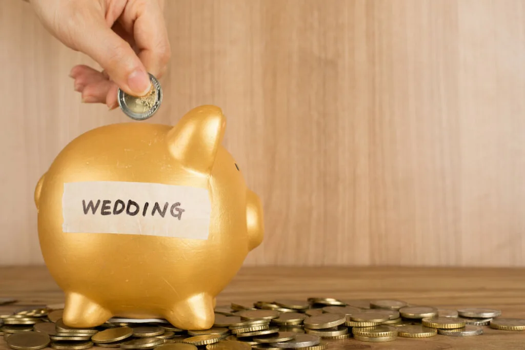 expensive wedding saving up gold piggy bank