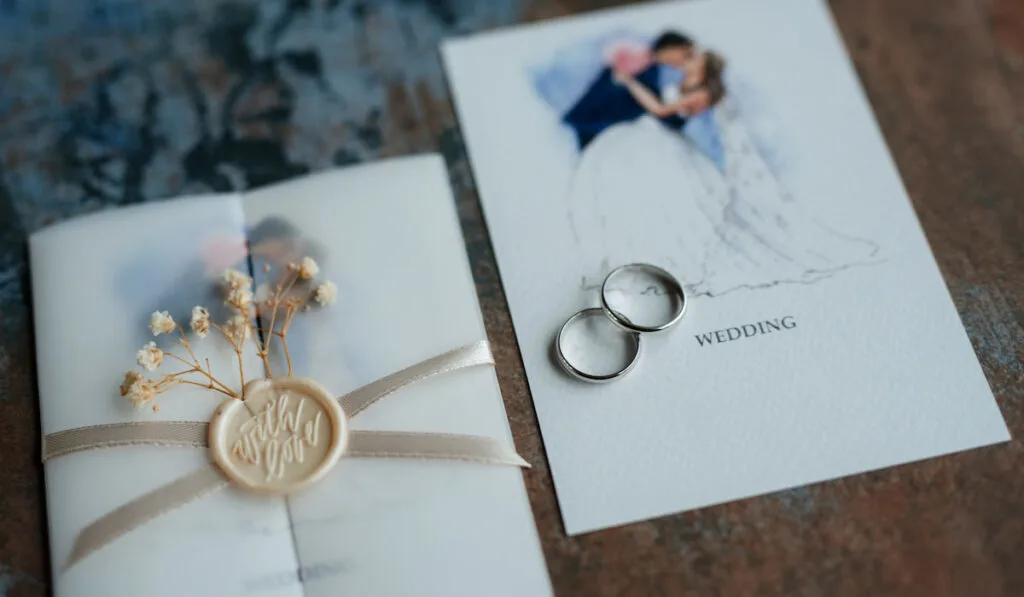 gold wedding rings with a invitation wedding
