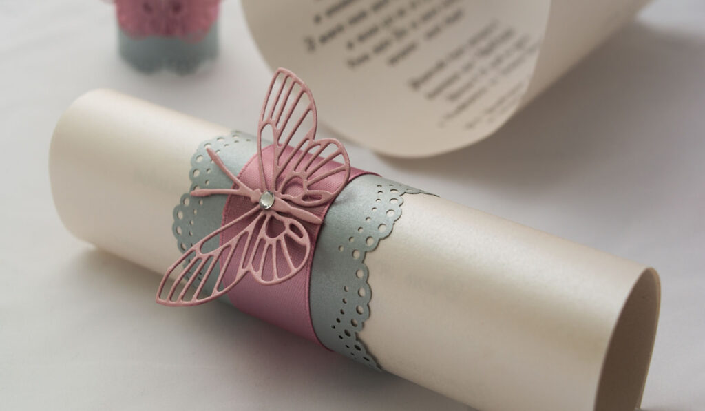 scroll paper wedding invitation designed with butterfly 