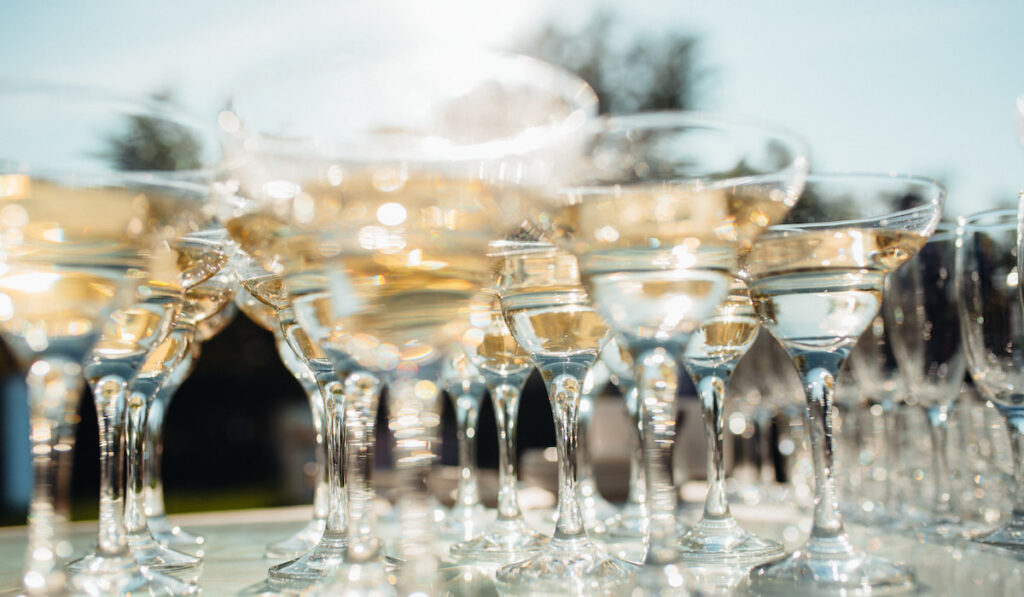 wedding glasses for wine and champagne outdoor on wedding reception