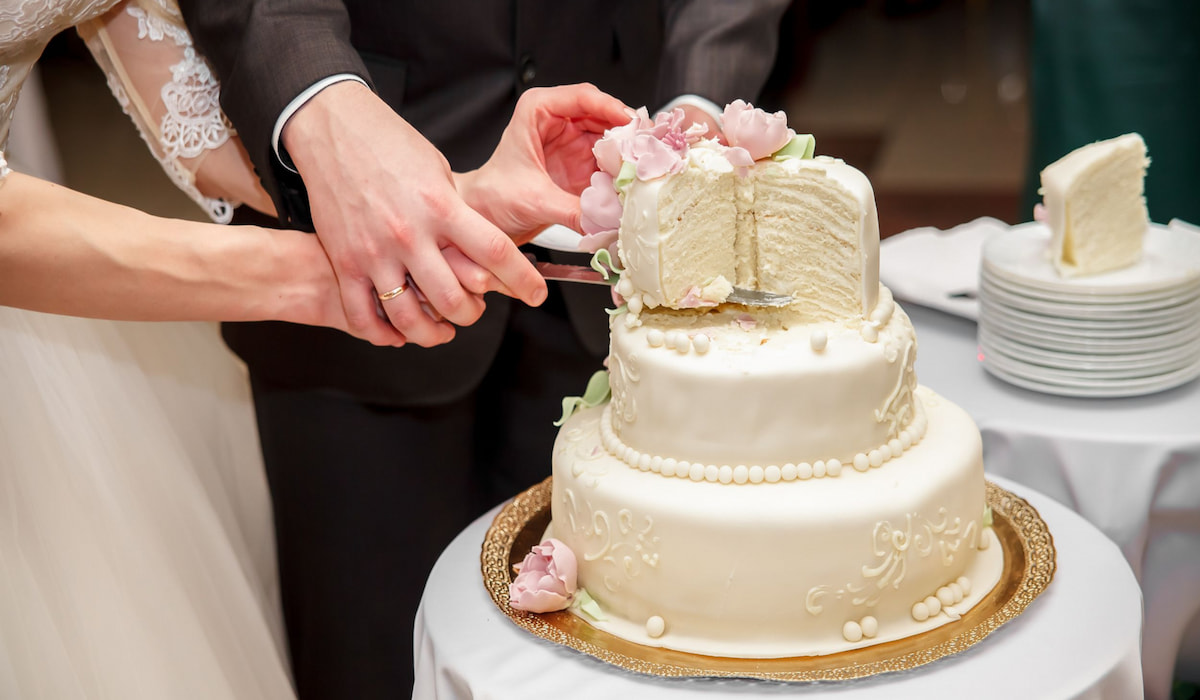 What Does Cutting a Cake at a Wedding Mean? - My White Sand Wedding