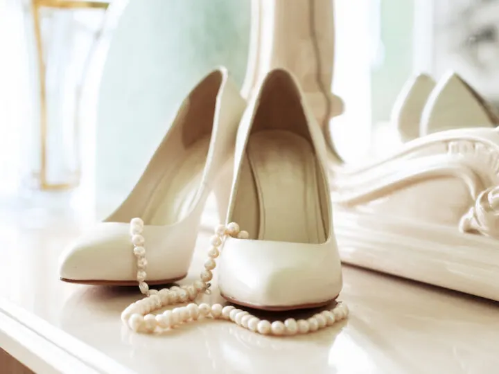 White-wedding-shoes-and-pearl-necklace