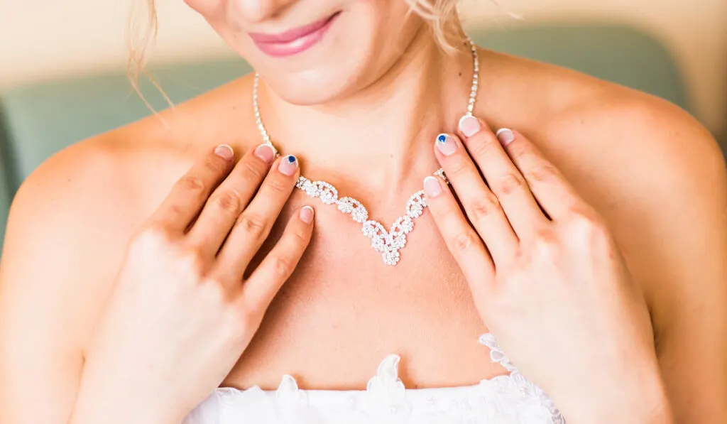 necklace on the neck of bride
