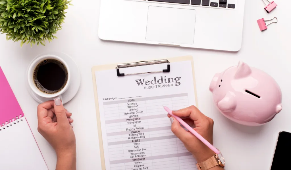wedding planner in the table with piggy bank on the side