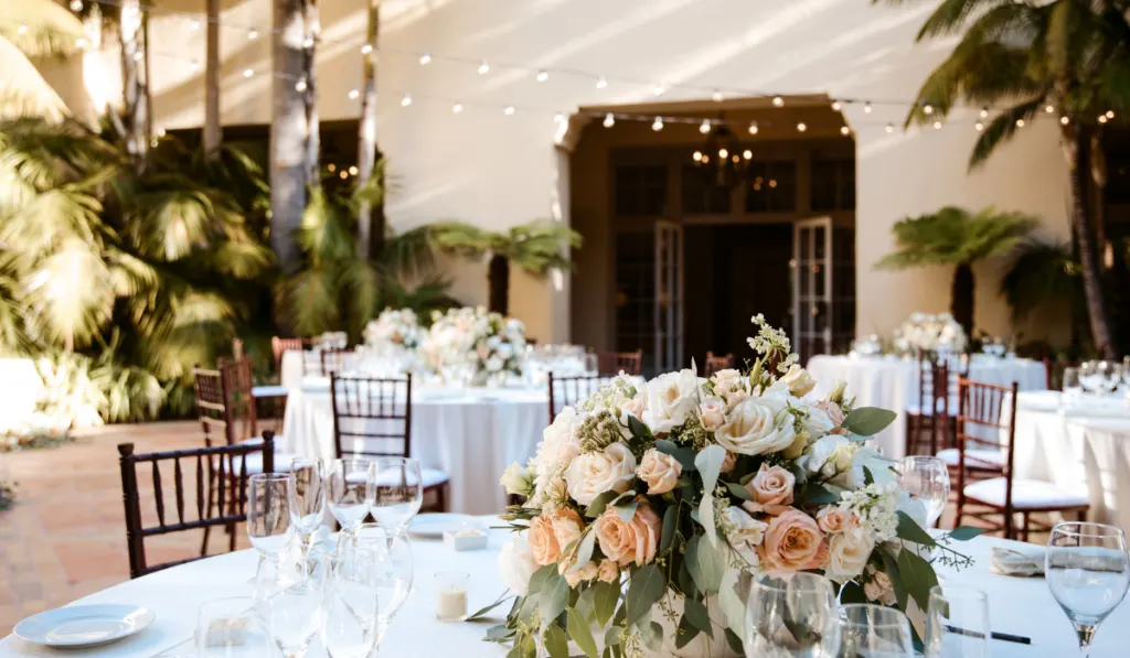 wedding reception with beautiful flower as table center piece