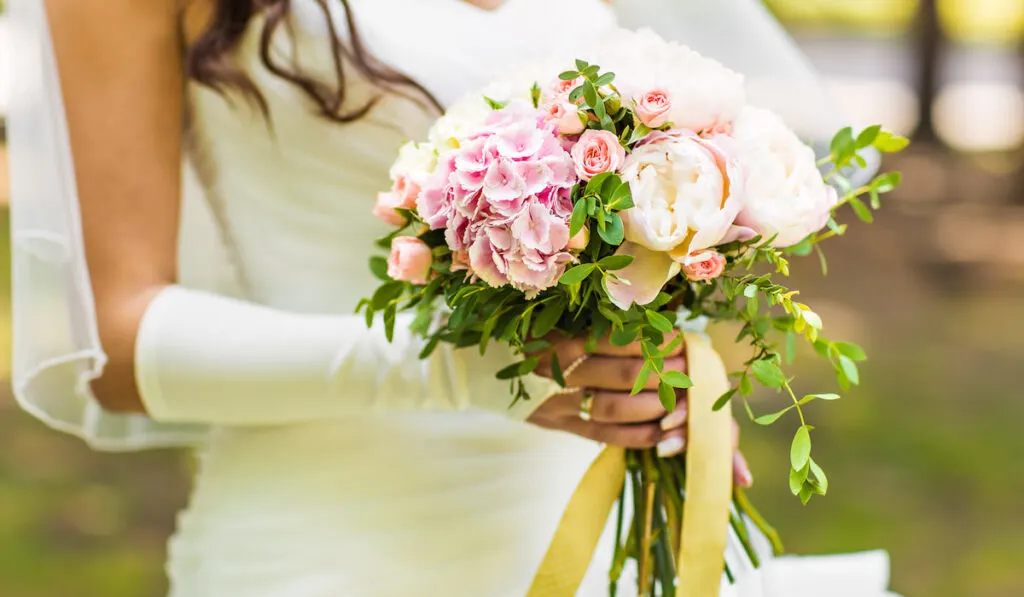 Bride holding her wedding bridal bouquet