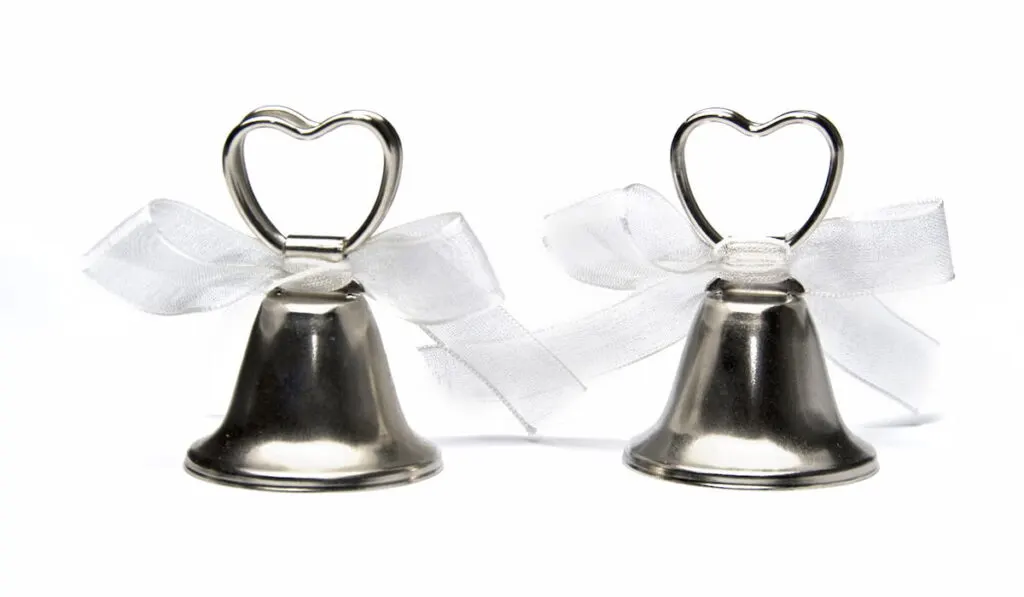 Two small wedding bells isolated on white background
