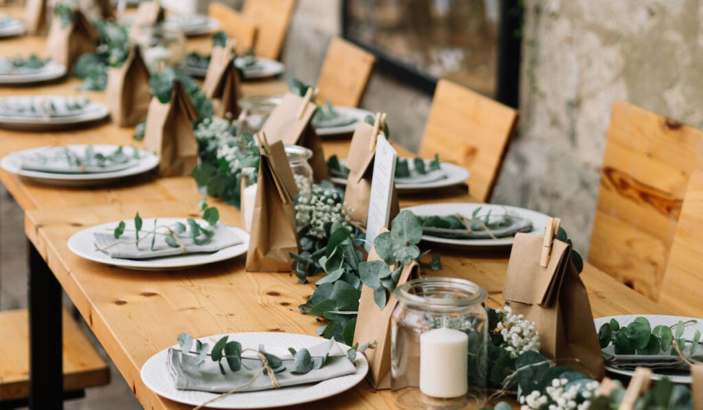 Wedding table decoration with natural styling using eucalyptus on the table