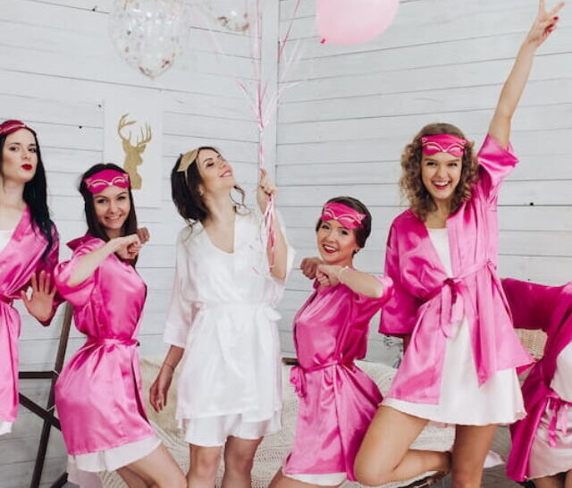 cropped-Bridesmaids-and-bride-having-fun-at-bachelorette-party-ee221009.jpg