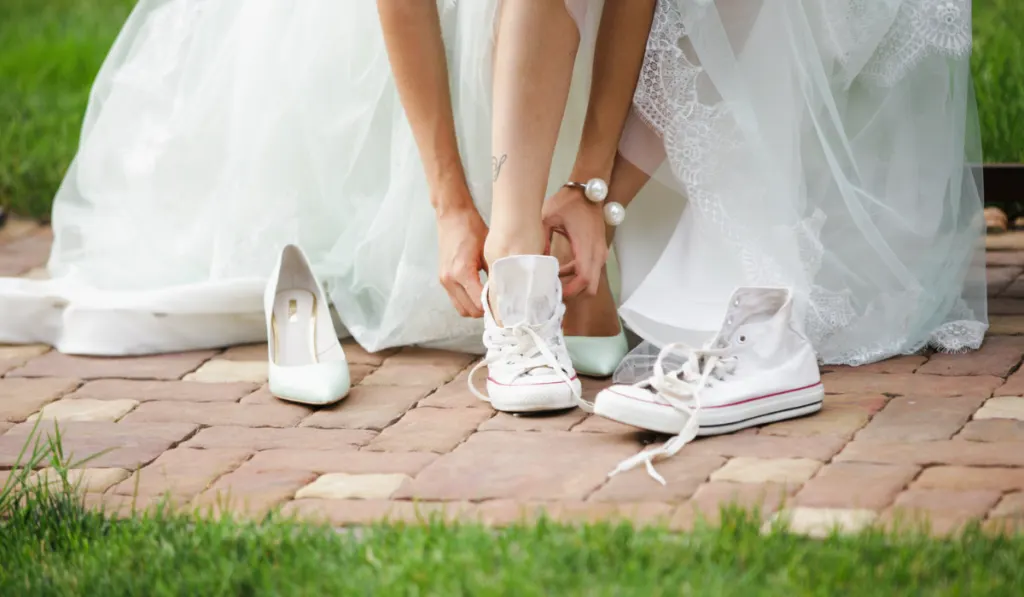 Bride change shoes sneakers
