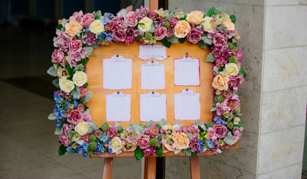 Floral frame with a list of wedding guests
