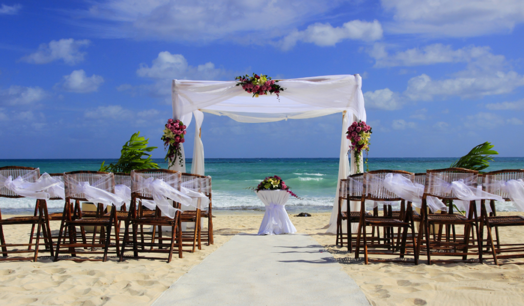 Wedding preparation on Mexican beach against a background of beautiful sea and blue sky
