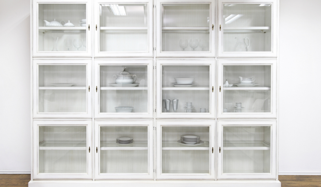 White cupboard display cabinet with glass doors
