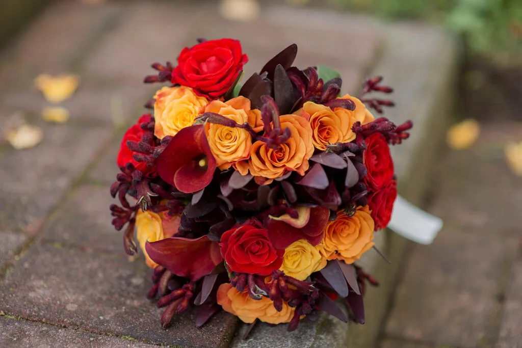bridal bouquet with orange color and yellow roses