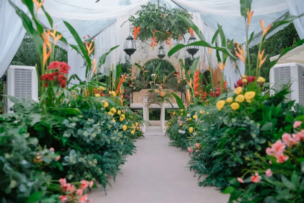 full of green and colorful flower on a tropical theme wedding