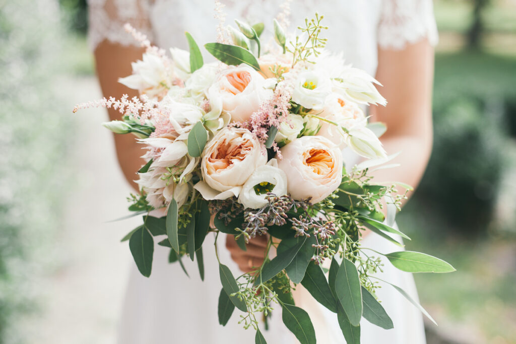soft pink flowers with sage leaves bride bouquet